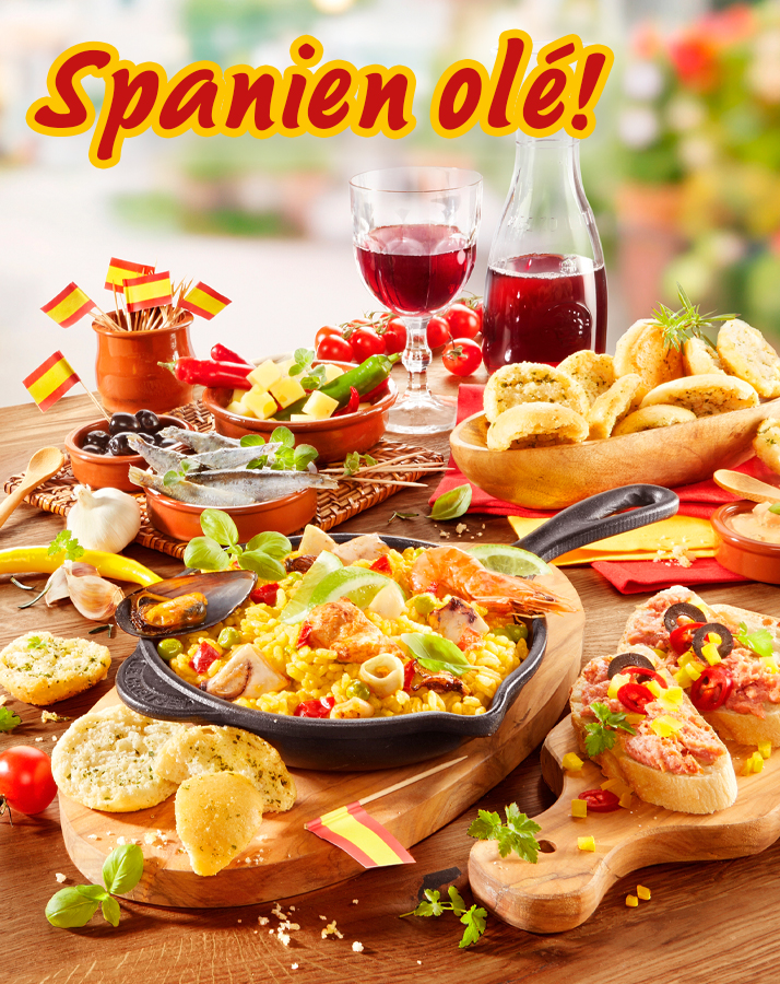 Spanische Spezialitäten mit Paella, Tapas und Wein