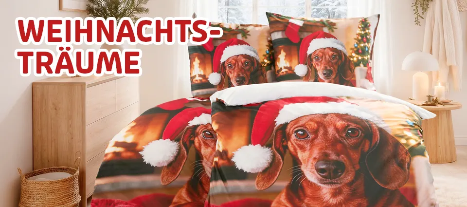 Bettwäsche mit Dackelmotiv und Weihnachtsmützen im Schlafzimmer