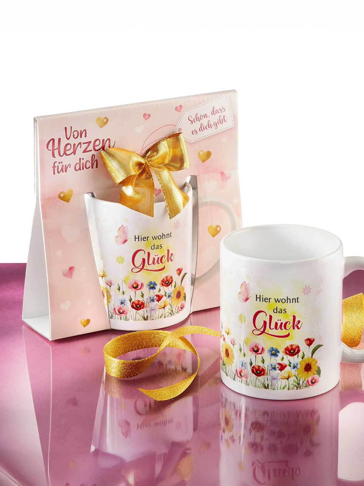 Geschenktasse „Hier wohnt das Glück“