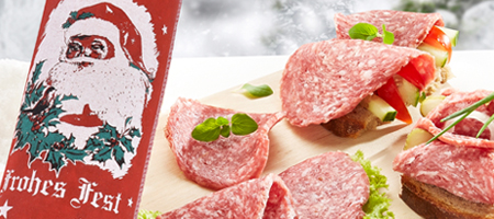 Wurstaufschnitt mit Aufschrift Frohes Fest