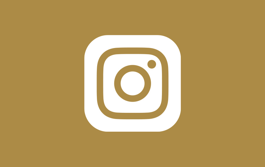 Instagram-Symbol auf goldenem Hintergrund