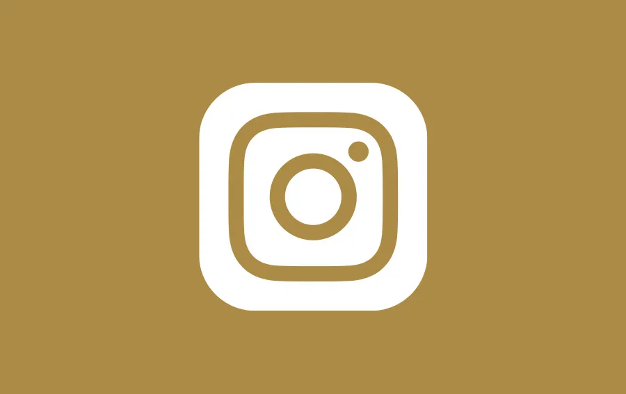 Instagram-Symbol auf goldenem Hintergrund