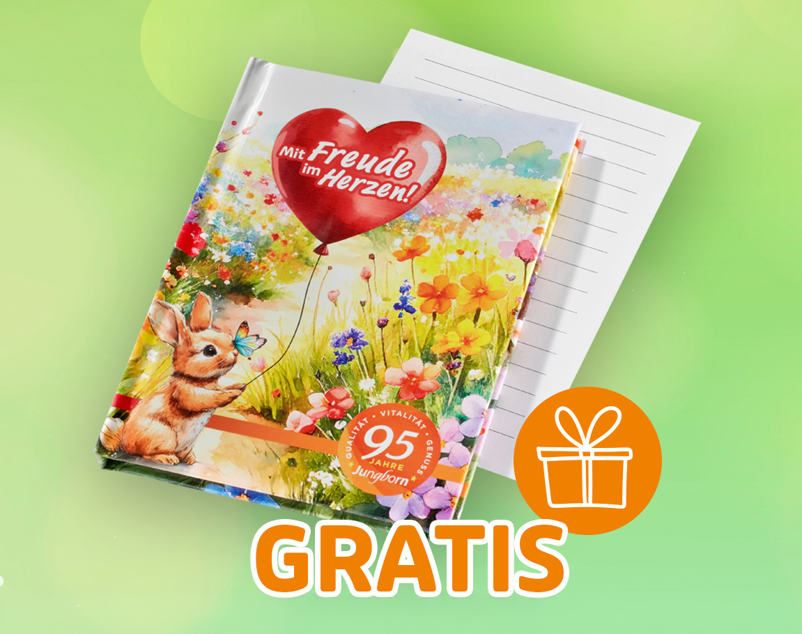 „Buntes Notizbuch mit Blumenmotiv und Herzschriftzug ›Mit Freude im Herzen‹, gratis.“