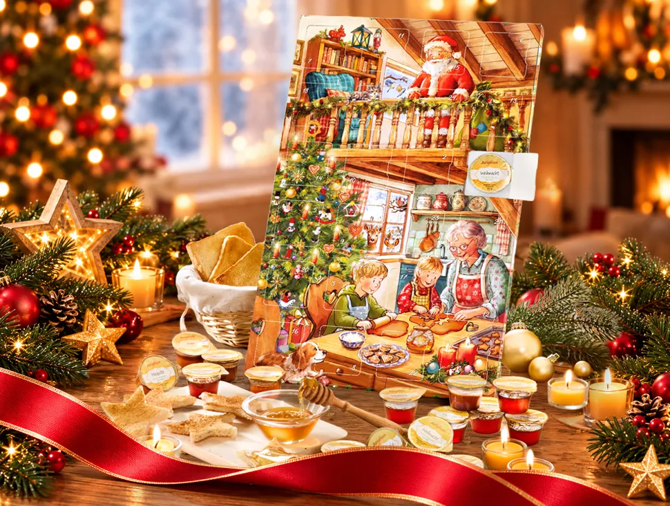 Adventskalender mit weihnachtlichem Backmotiv und kleinen Genussbeigaben