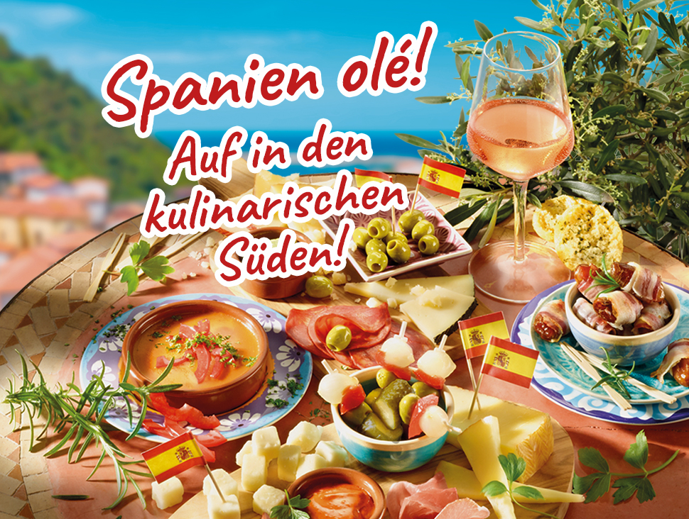 Spanien Olé! Kulinarische Spezialitäten vor mediterraner Landschaft.