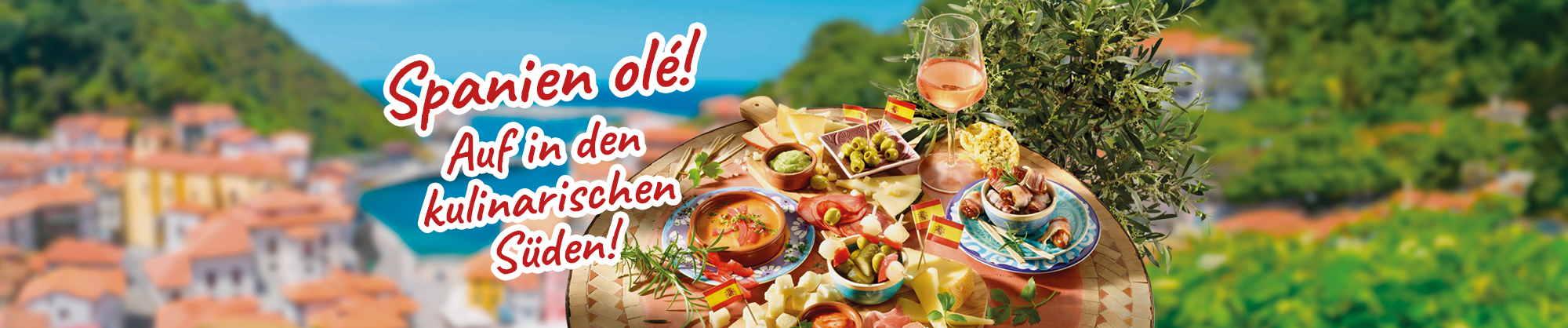 Spanien Olé! Kulinarische Spezialitäten vor mediterraner Landschaft.