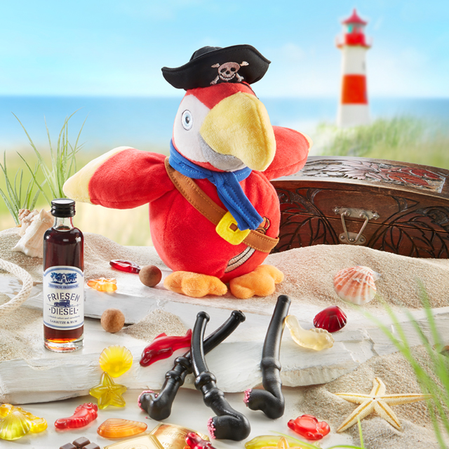 Maritime Süßigkeiten mit Piratenpapagei und Leuchtturm im Hintergrund