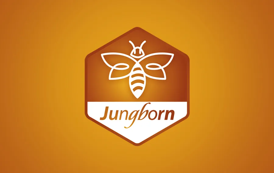 Logo der Qualitätsmarke Jungborn Honigspezialitäten auf einem orangen Hintergrund