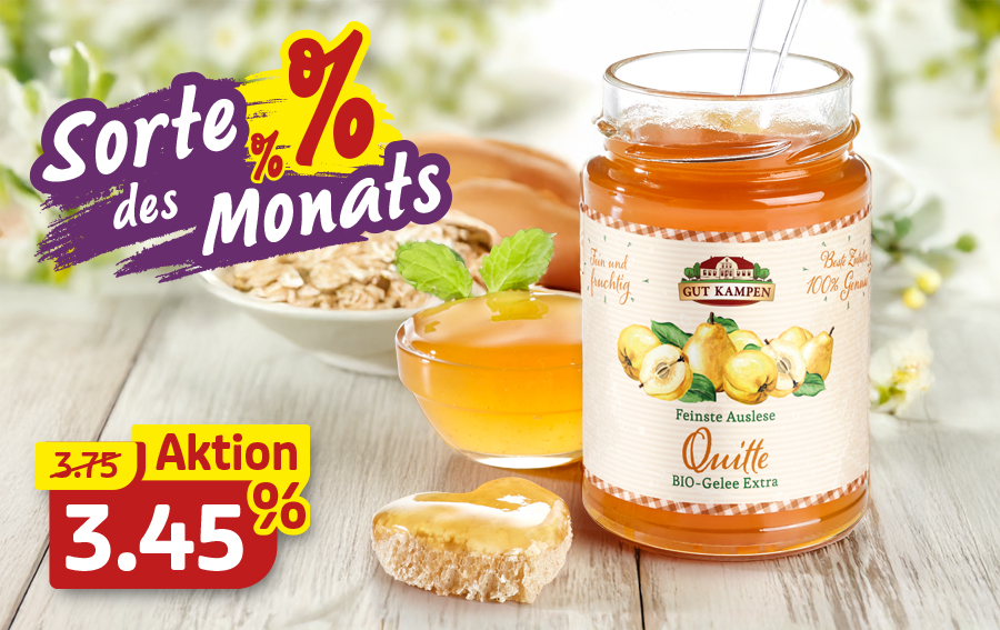 Glas Quittengelee mit Brot, Frühstücksflocken und Minzdeko