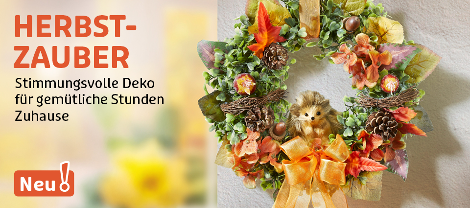 Bunter Herbstkranz mit Deko-Igel und Blättern