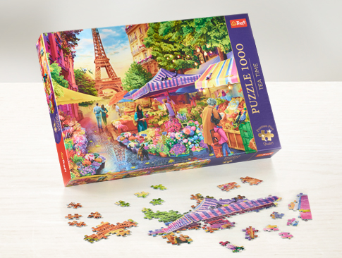Puzzle mit farbenfrohem Marktmotiv und Eiffelturm